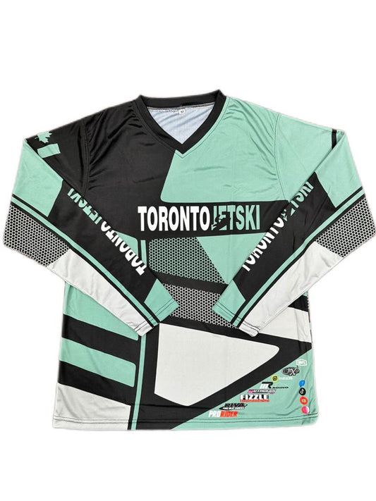 New Design Toronto Jet Ski Jersey in vibrant teal and black color scheme. The jersey features bold black stripes running diagonally across the chest and sleeves, with 'Toronto' printed in sleek black font on the front. The material is lightweight and breathable, perfect for high-performance jet skiing.