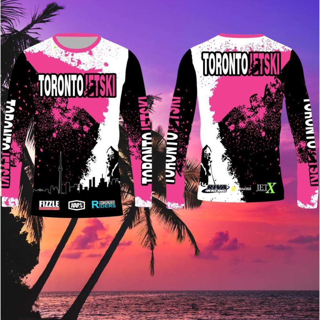 Toronto Jet Ski Water Sport Jersey in pink, white, and black, featuring the iconic Toronto skyline in black with white outlines on the front. 'Toronto Jetski' is prominently displayed on the chest and sleeves, with 'Toronto' in white and 'jetski' in pink. The front and back of the jersey mirror each other in design, offering a stylish and unified look for water sport enthusiasts.