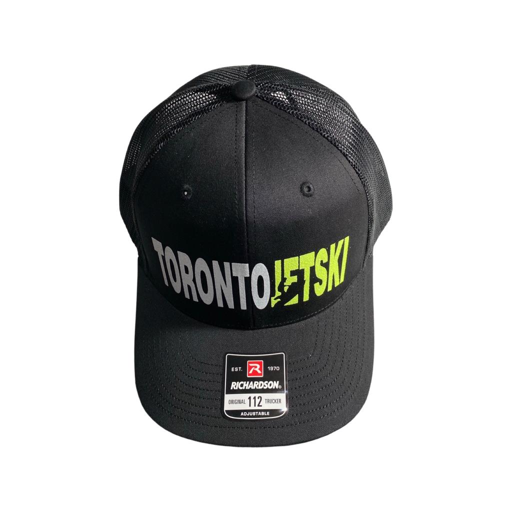 Toronto Jet Ski Snapback Trucker Hat in Black: This sleek black hat showcases the 'Toronto Jet Ski' logo embroidered in vibrant neon yellow, adding a pop of color to its sophisticated design. The snapback closure ensures a comfortable fit for all-day wear, making it a stylish and practical accessory for your watersport adventures.