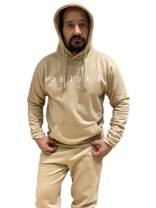 Toronto Jet Ski 416 Legacy Track Suit in beige, a stylish and comfortable ensemble perfect for jet ski enthusiasts. The track suit features the iconic 'Toronto Jet Ski 416' branding, offering a blend of urban flair and practical design. The beige color adds a touch of sophistication to your watersport attire.